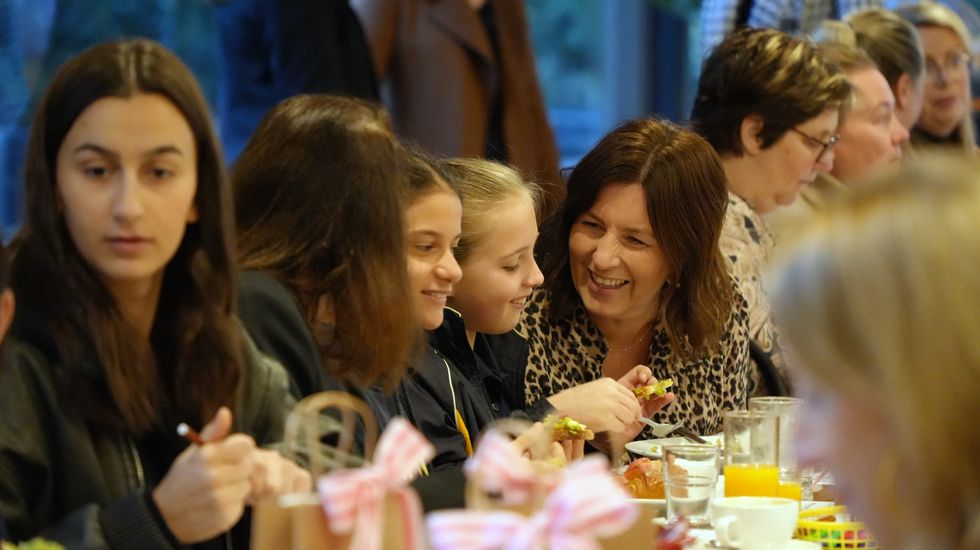 Mothers and daughters interacting at the Ruyton Mother's Day Breakfast 2023