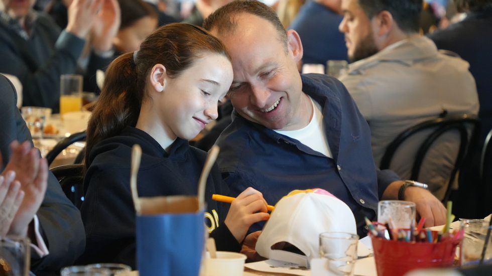 A father and daughter interacting at the Ruyton Father's Day Breakfast 2023