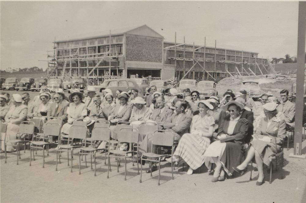 Parents gathered outside 1950s