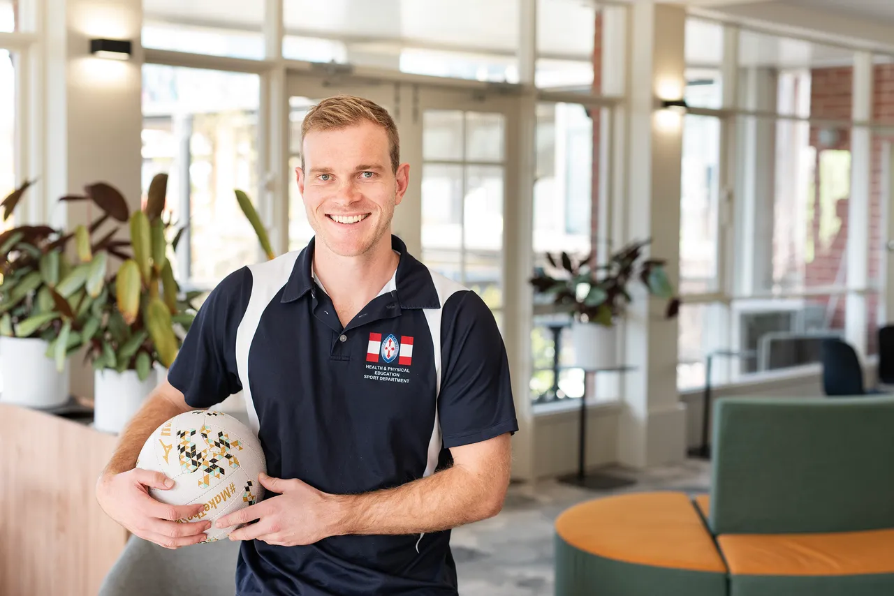 St Michael's Sport coach in staffroom