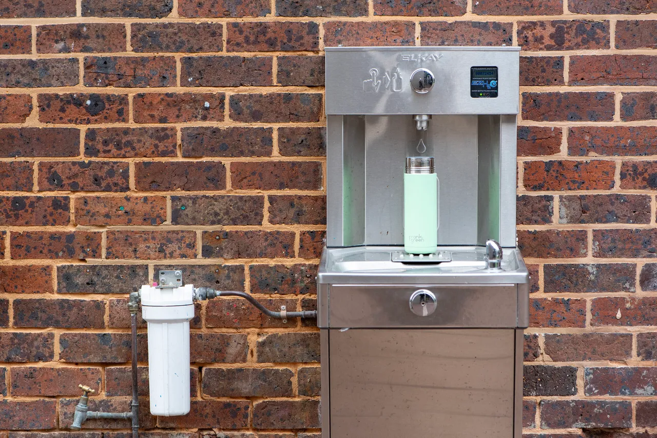 Refillable water bottle station