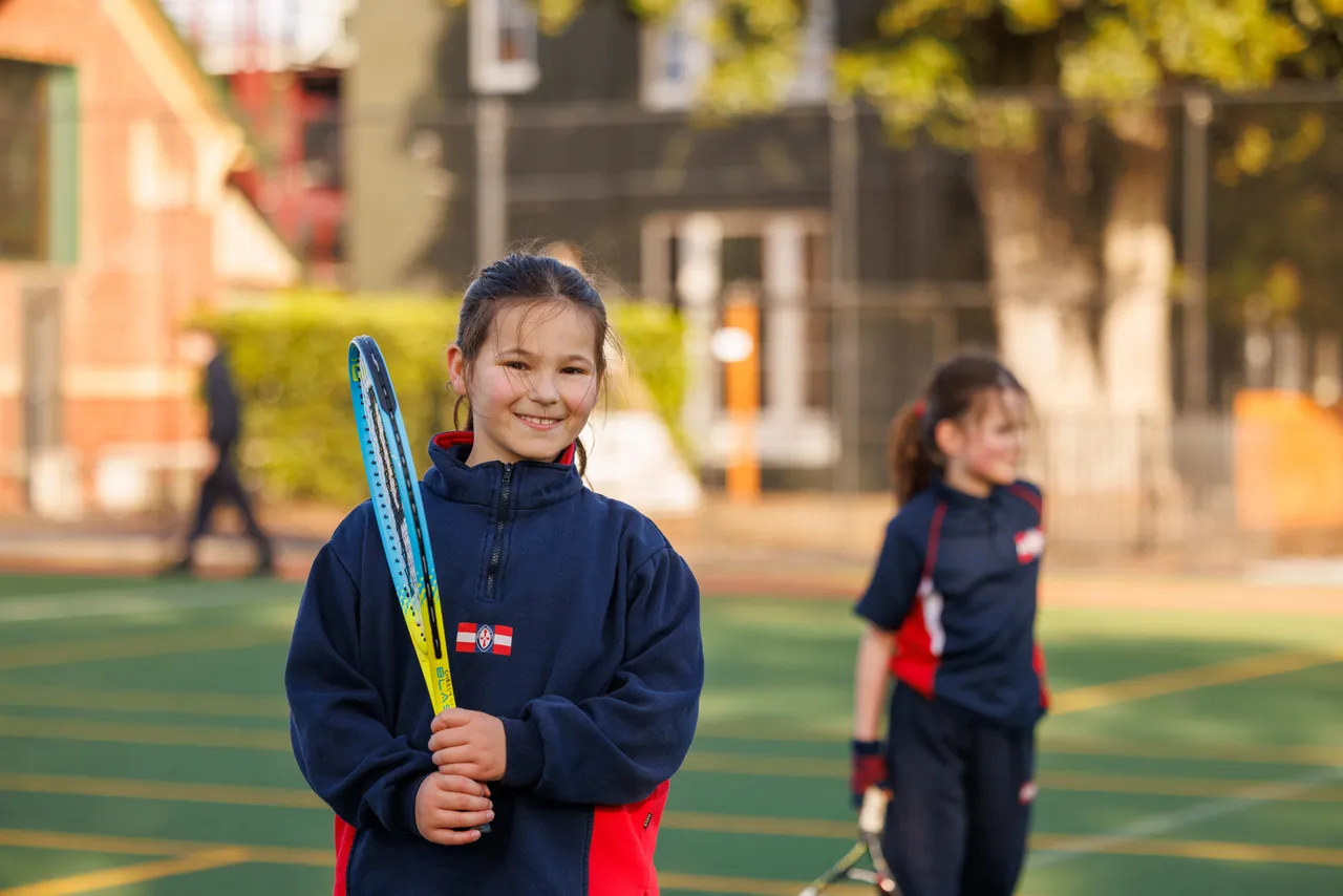 St Michael's Grammar School students engaged in an Tennis a Extended Tuition Program activity after school.