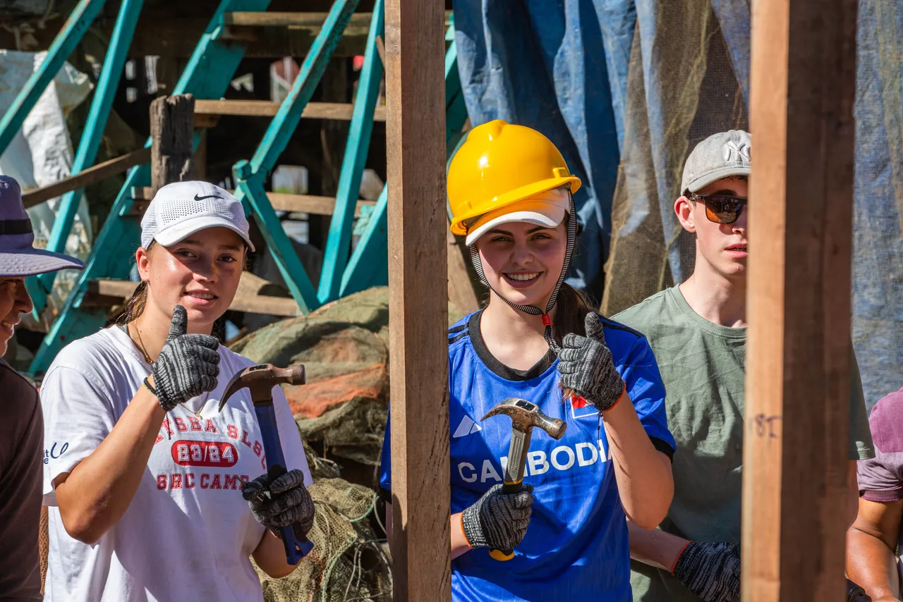 St Michael's Grammar School students participating in the Year 9 Cambodia Service Learning program, working alongside local community members.