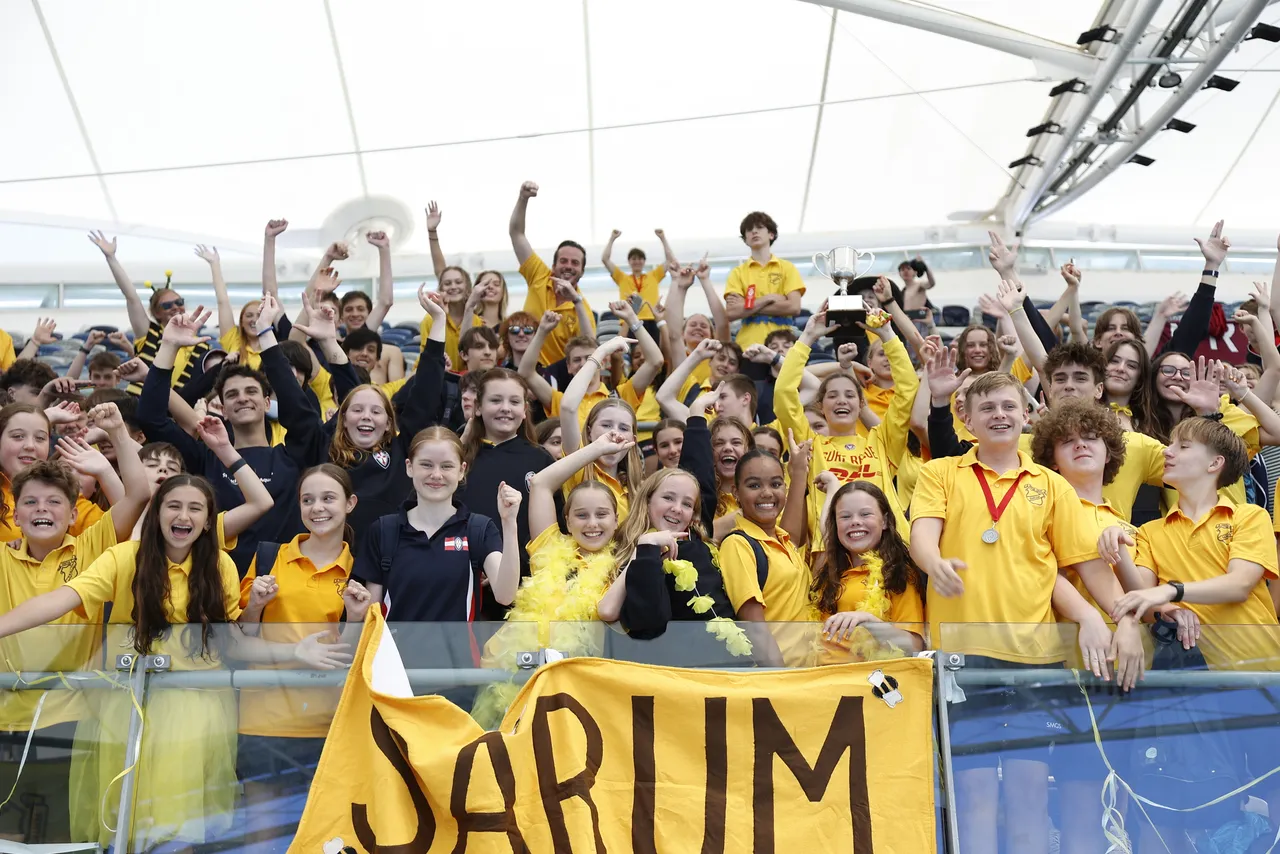 Students cheer on Sarum house during an Athletics carnival.