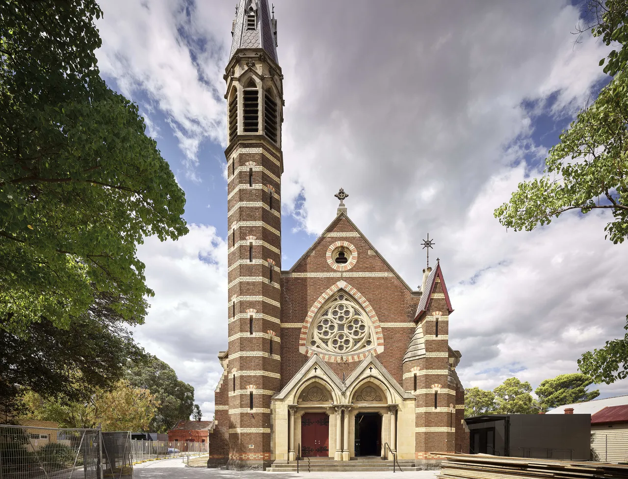 The exterior of St Michael's Grammar School's heritage church building in St Kilda, featuring its distinctive Gothic Revival architecture and bell tower.