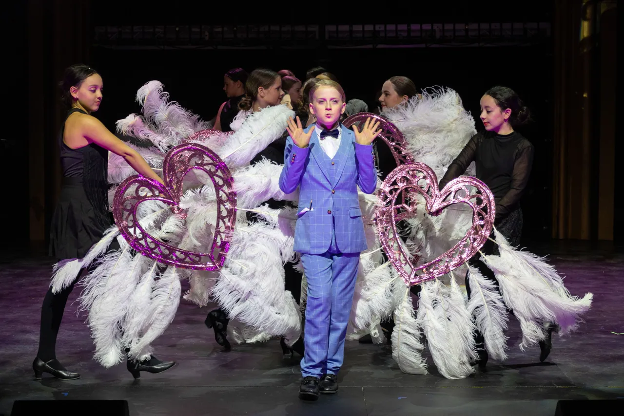 St Michael's Grammar School students perform on stage during a school production at the Performing Arts Centre, St George's.