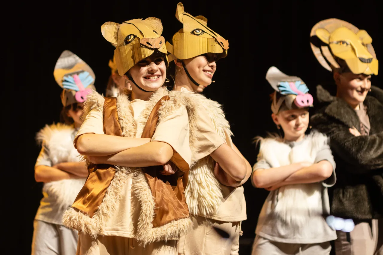 St Michael's Grammar School students participating in a performing arts performance of the Lion King.