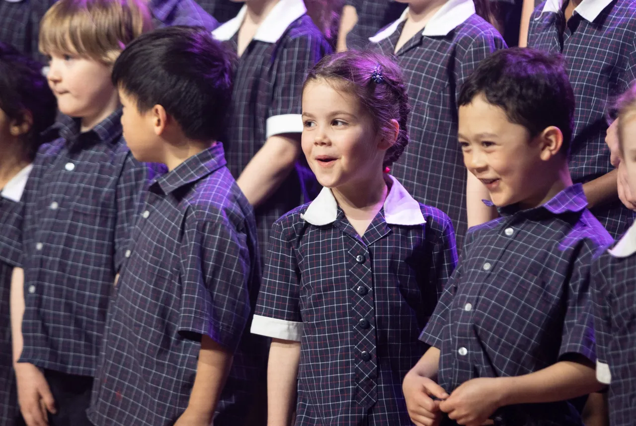 St Michael's Grammar School students participating in a choir performance.
